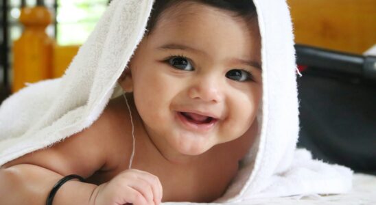 girl in white towel on head
